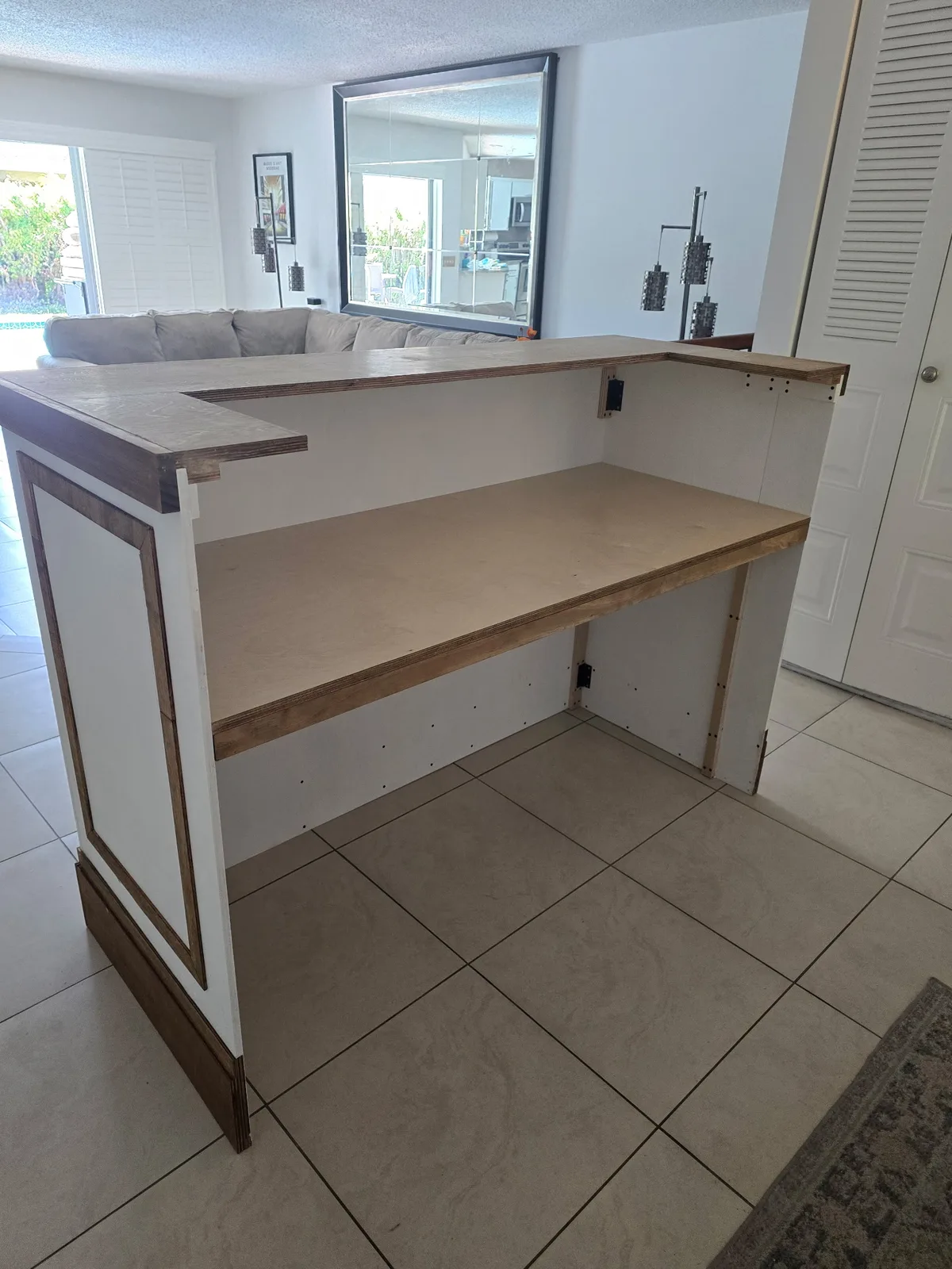 Interior of a folding mobile bar with full-width work shelf